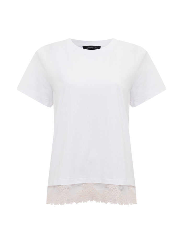 The Sanctuary Clothing cami remix tee white is a short-sleeve T-shirt with a round neckline and beige lace-trimmed hem, shown on a white background.