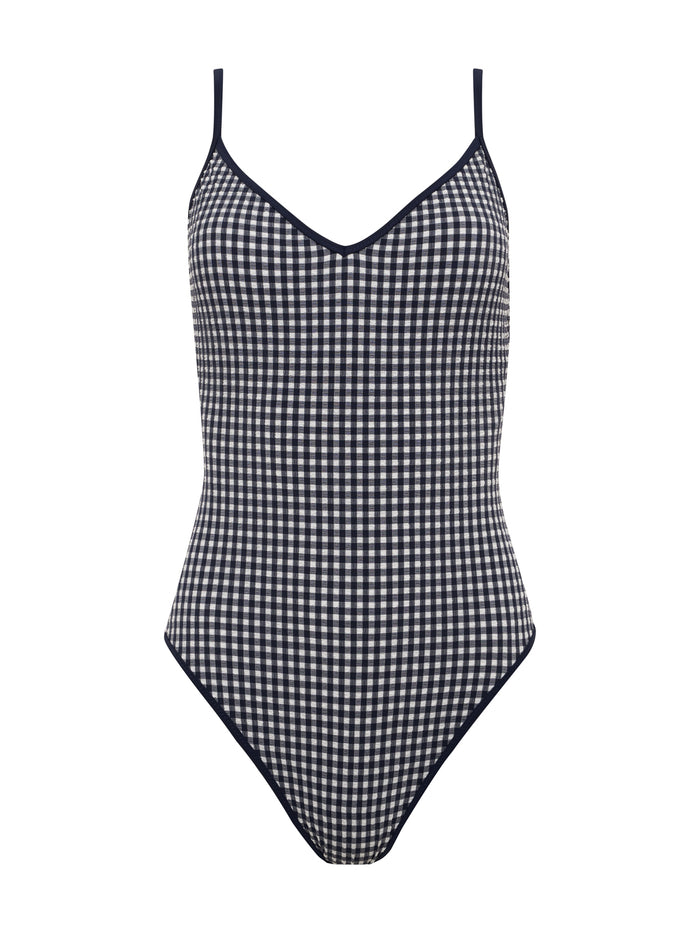 The Sanctuary Clothing high leg scoop neck one-piece swimsuit in navy features thin shoulder straps and is displayed against a white background.