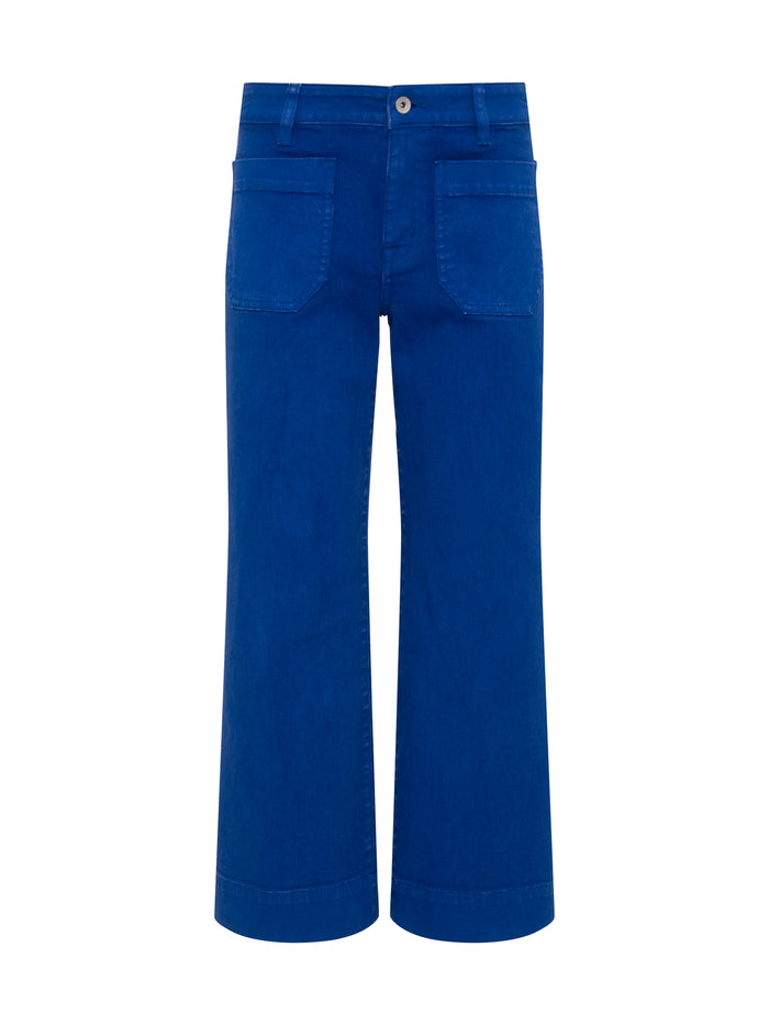 The marine luminous blue by Sanctuary Clothing—bright blue, high-waisted, wide-leg pants with front patch pockets and button waist closure—shown on a white background.